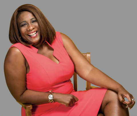 Tonya Butler headshot against gray background