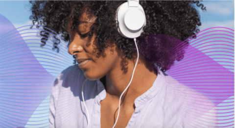A photo of someone wearing headphones. 