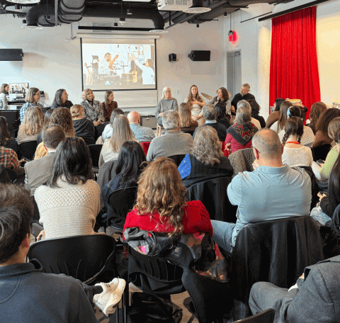 An image of a panel discussion. 